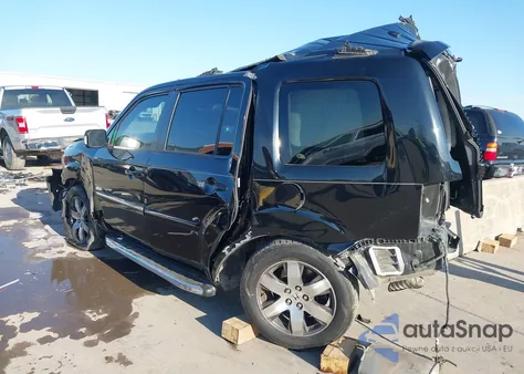 2015 Honda Pilot Touring z USA, uszkodzony, nr VIN 5FNYF3H97FB012419
